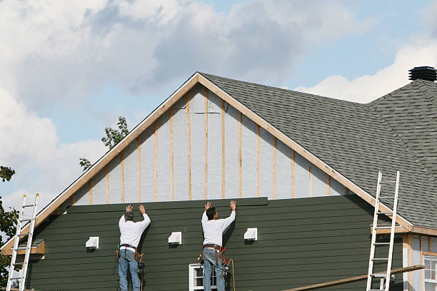Professional Siding Replacement technician working in Fairview, NC